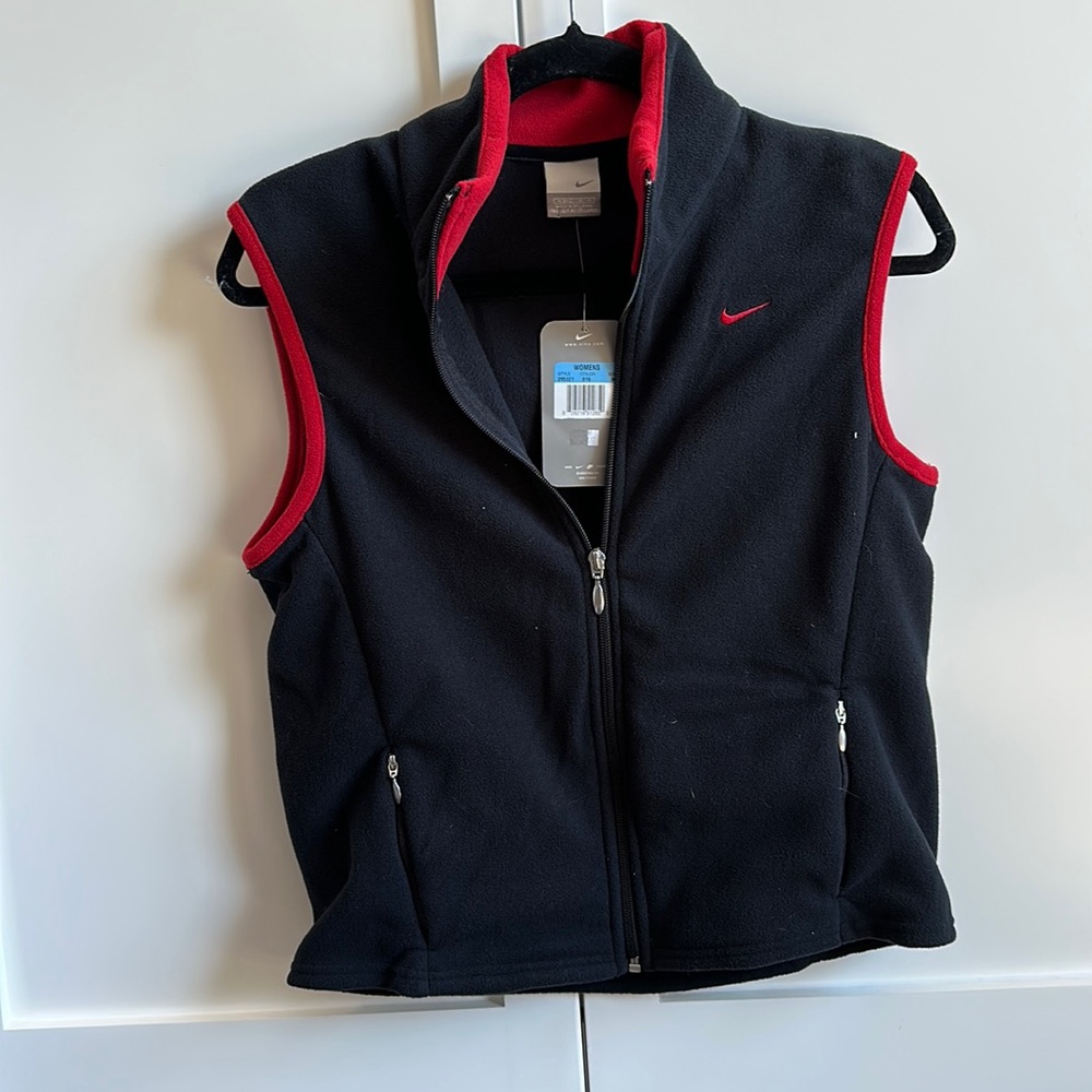 Red and black Nike lightweight fleece vest.